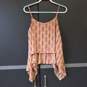 Spaghetti strap handkerchief top.